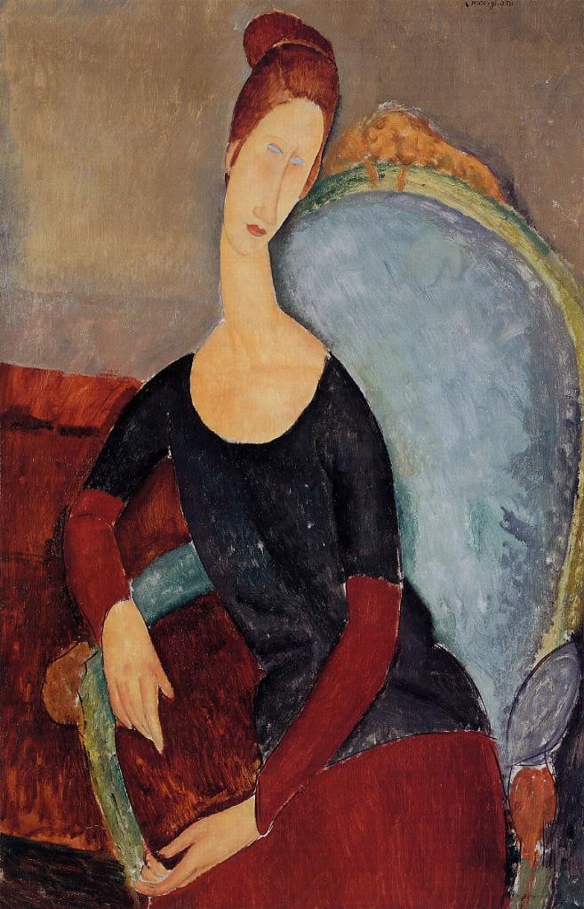 Portrait of Jeanne Hebuterne in a Blue Chair by Amedeo Modigliani