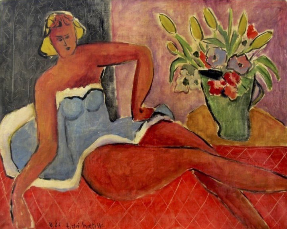Woman Lying Close to a Vase of Flowers by Henri Matisse