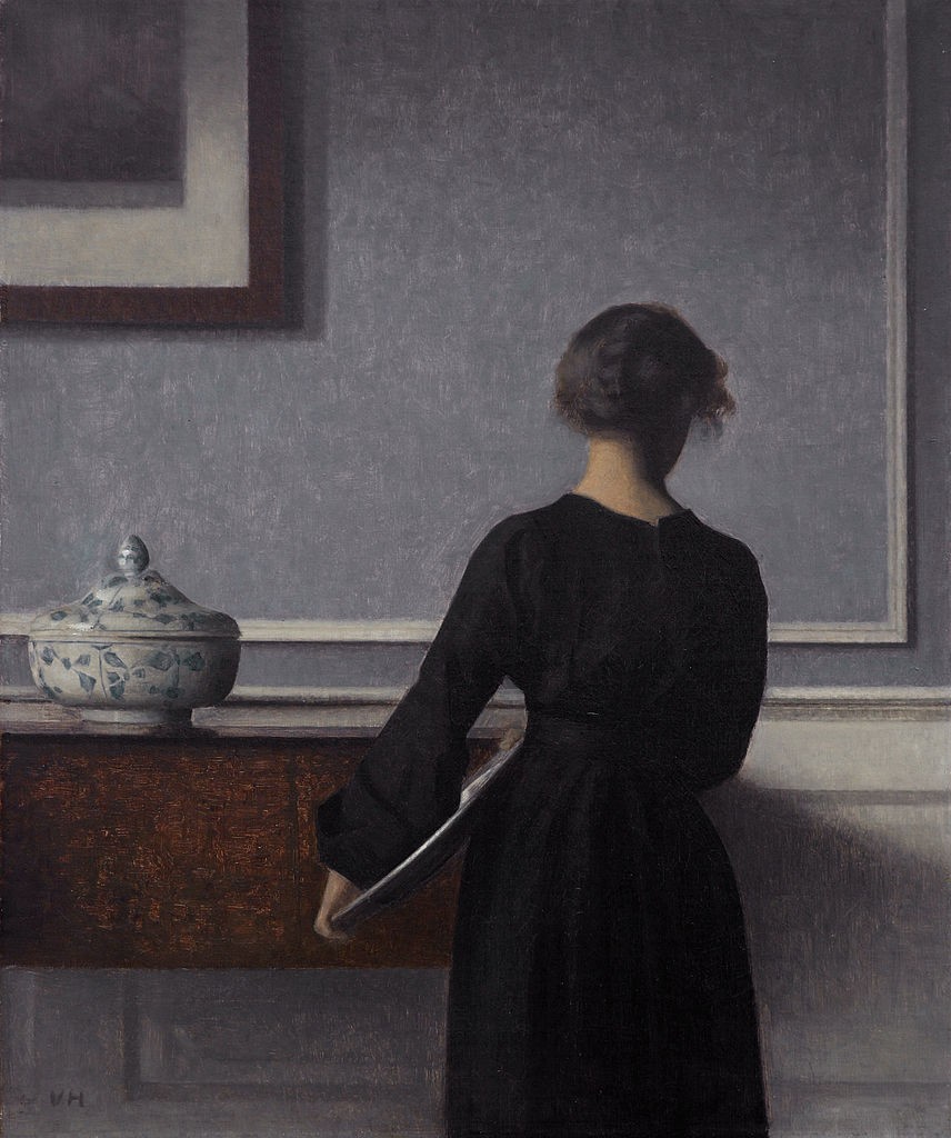 Interior with Young Woman from Behind by Vilhelm Hammershoi